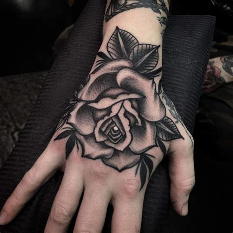 flower tattoo designs black white|negative rose tattoo.